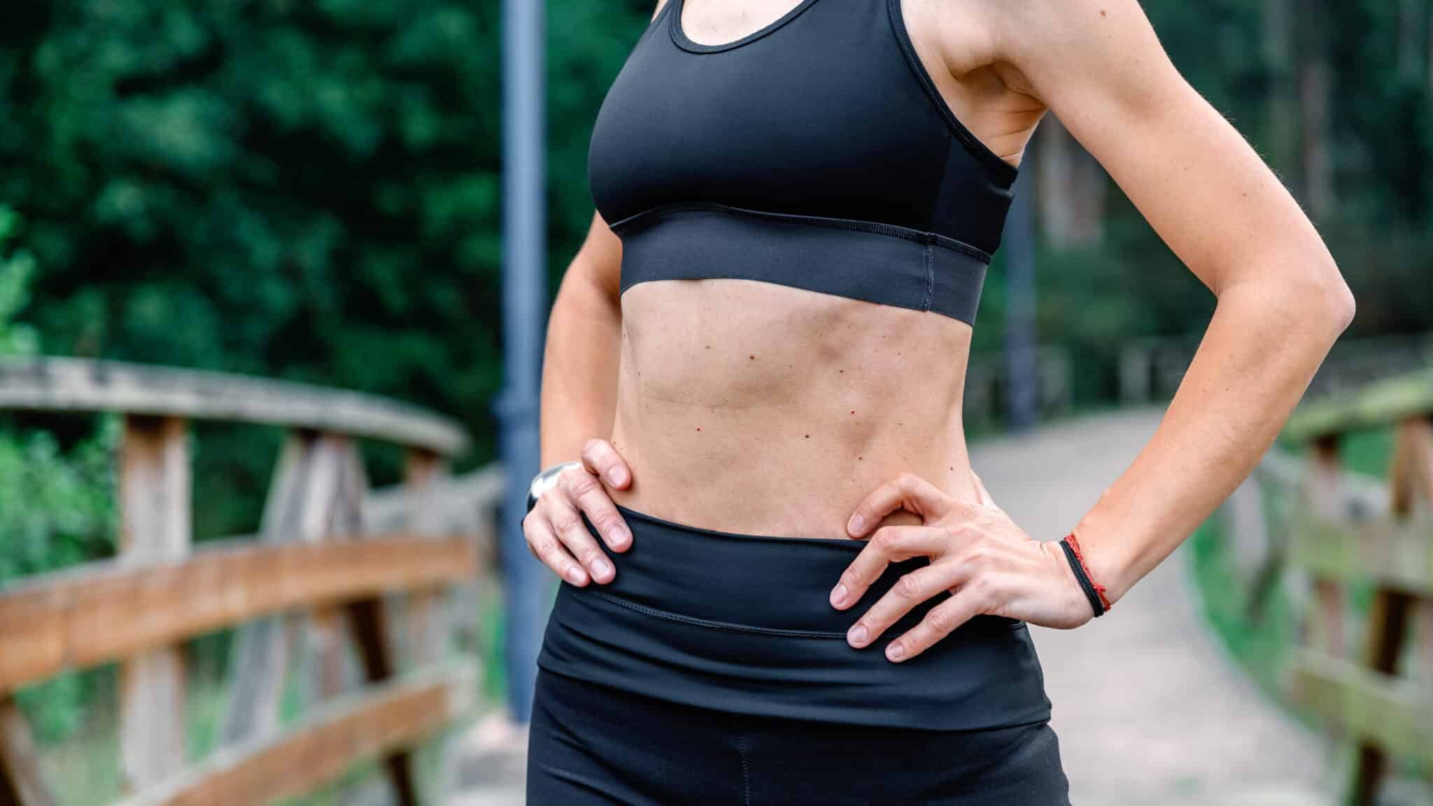 athlete woman posing with sportswear