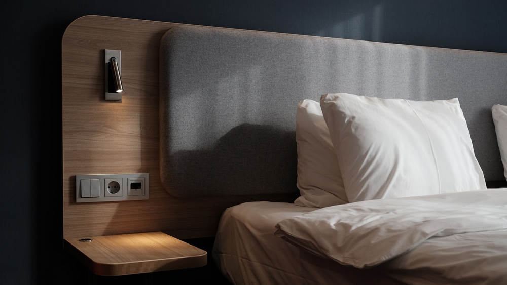 close up,fragment,of,bedroom,with,empty,bedside,table,,reading,lamp
