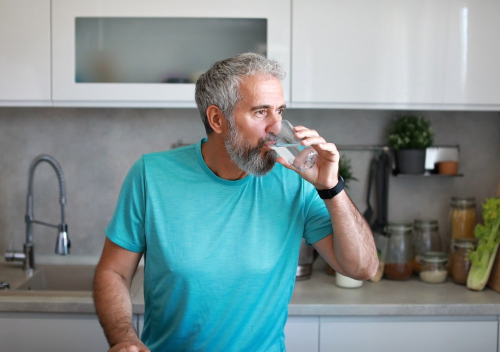 portrait,of,a,happy,senior,mature,mid,aged,man,holding